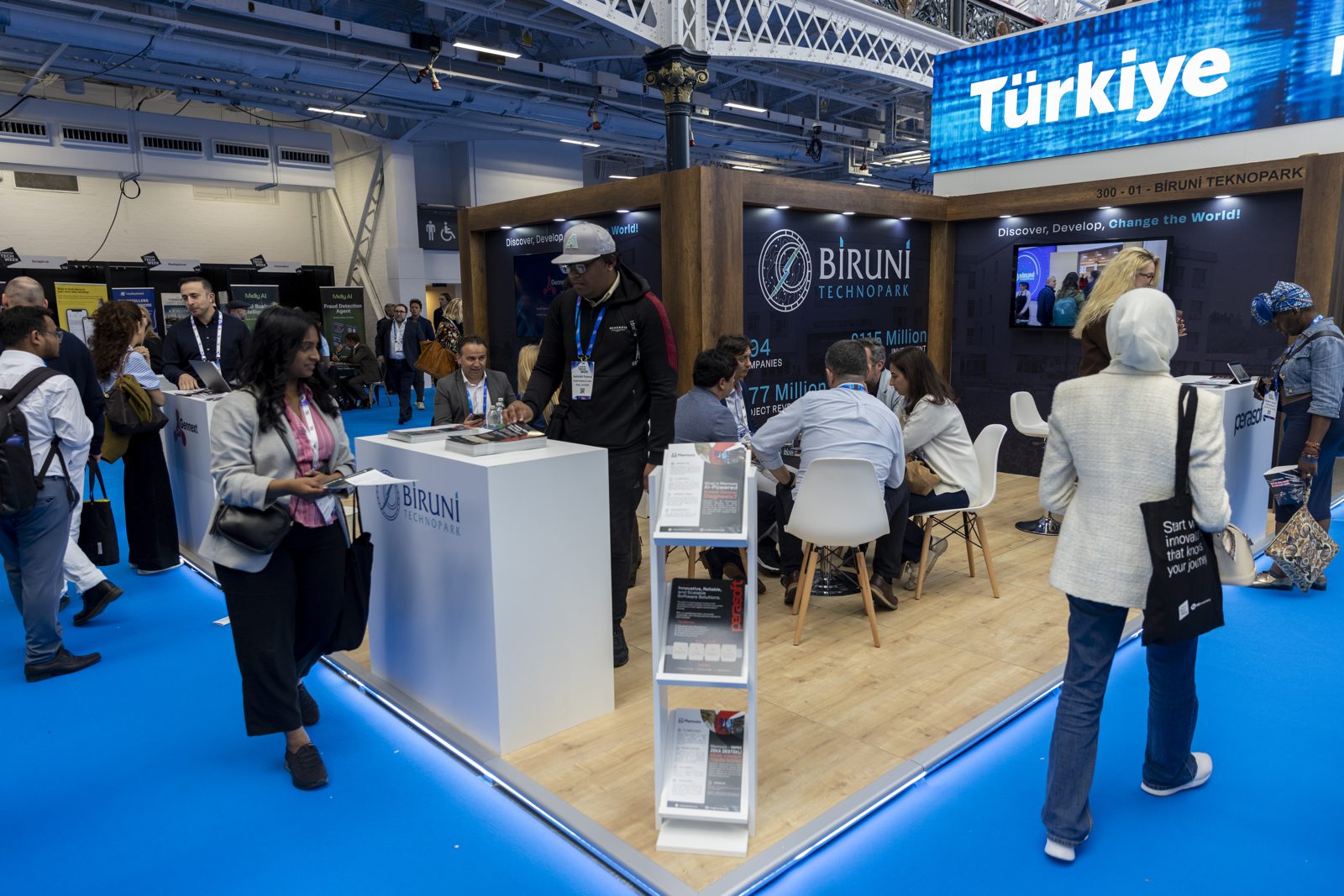 Exhibition stands and delegates on the floor of a London business expo